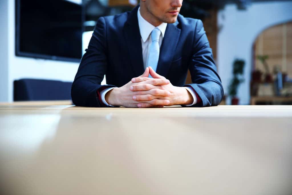 Portrait of a businessman sitting at office