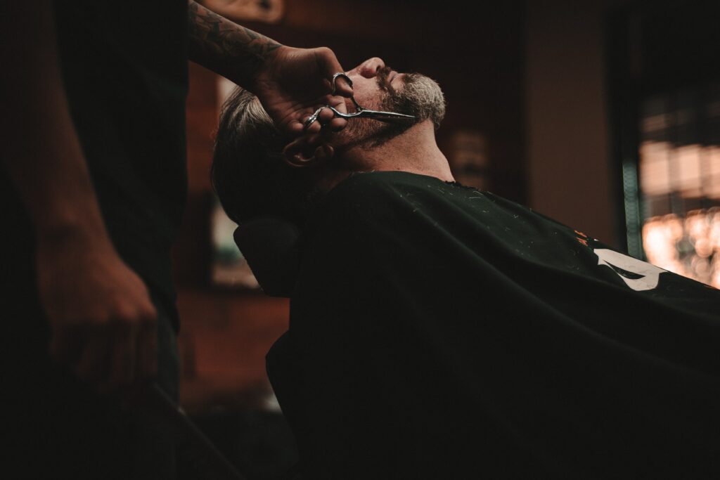 man in a barber chair